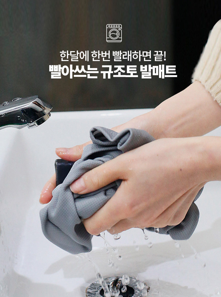 a woman is washing her hands with a cloth