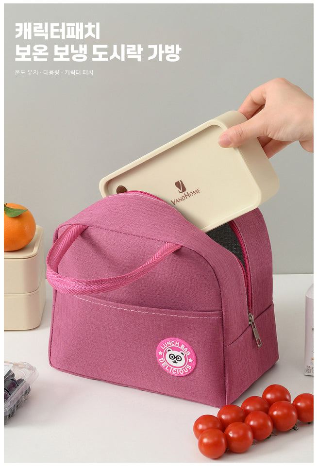 a pink lunch bag with a cell phone in it