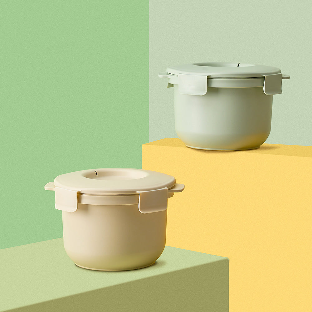 a white pot and a yellow container on a green and yellow background