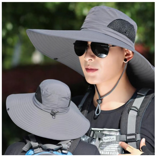 a woman wearing a gray hat and sunglasses