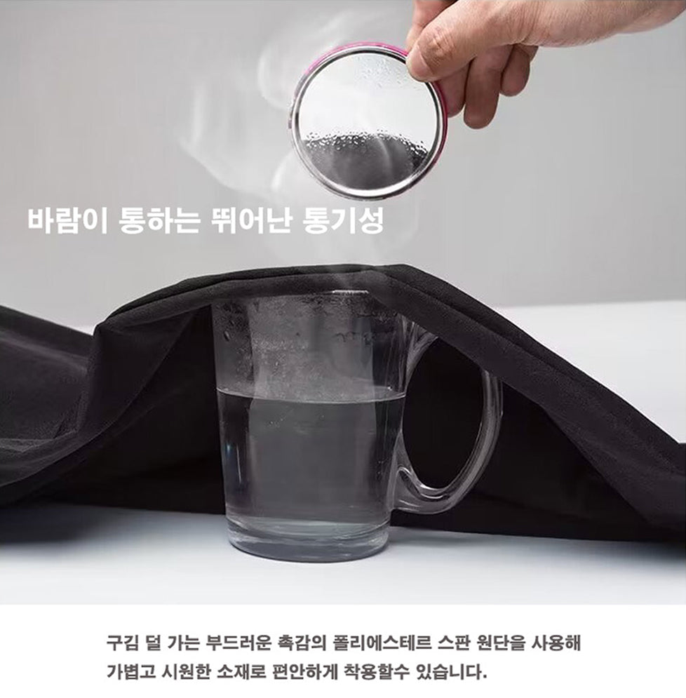 a person is pouring water into a cup